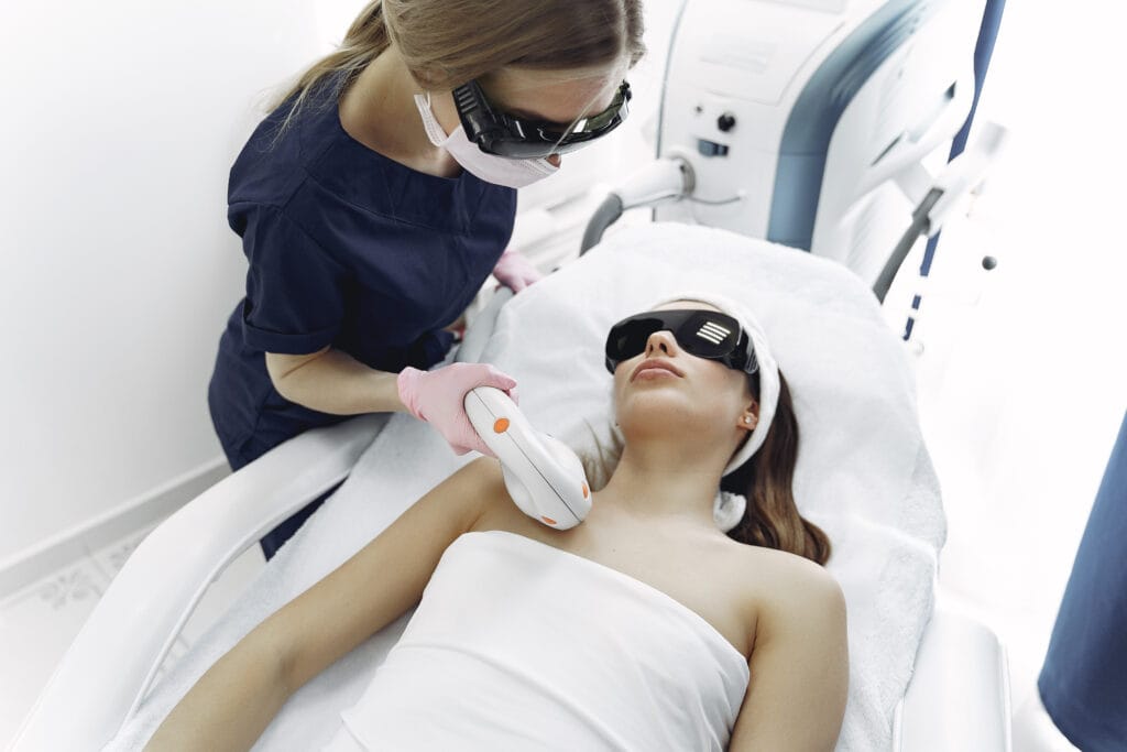 Laser hair removal treatment room image at Healthy Glow Aesthetics Fort Lauderdale